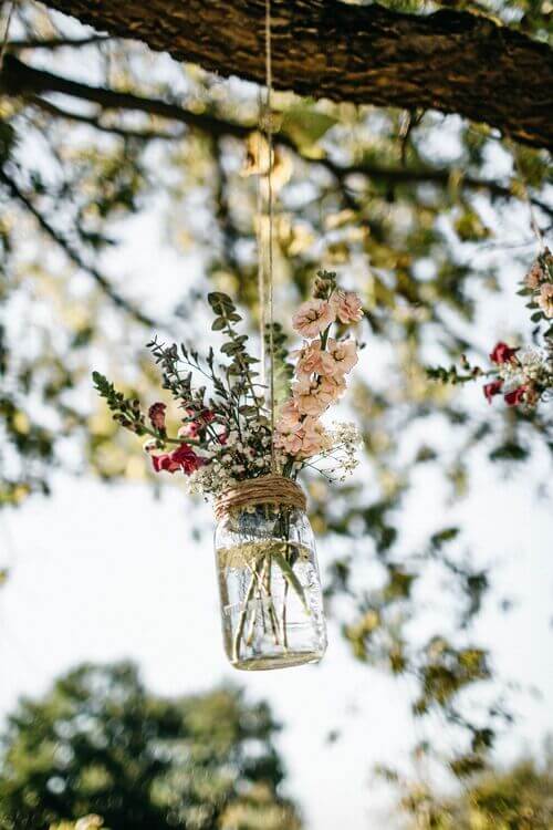 diy mason jar decor hanging in tree