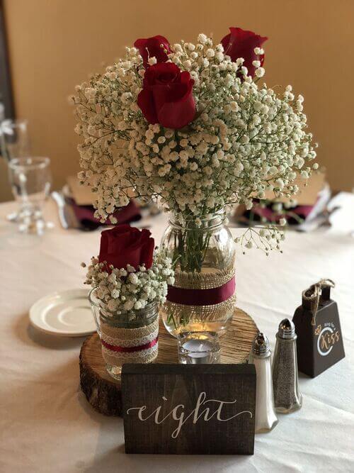 rustic red rose centerpiece for wedding