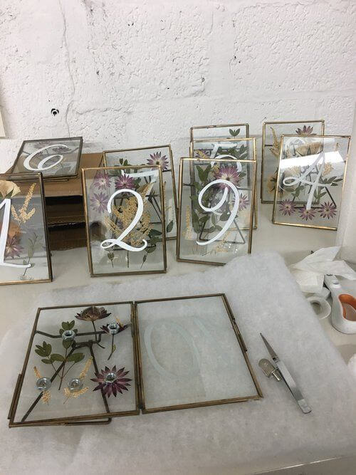 dried flowers in frame table numbers