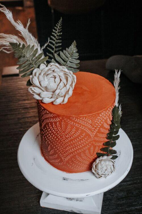 boho burnt orange wedding cake