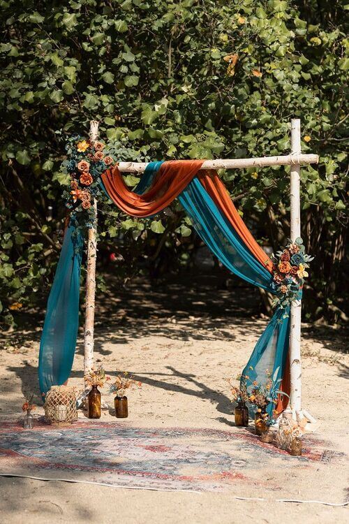 dark teal and burnt orange wedding color scheme