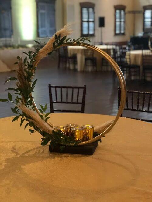 floral hoop centerpieces with greenery