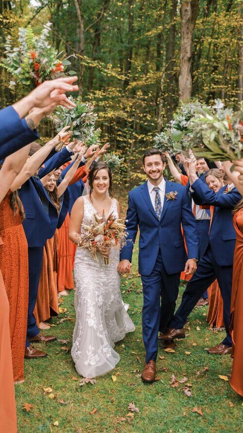 navy and burnt orange wedding attire