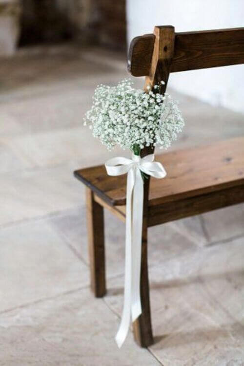 wedding aisle decor with baby breath