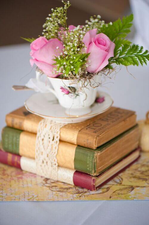 centerpiece with books and teacup