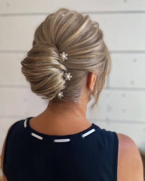 Voluminous French Twist with Silver Floral Hair Pins
