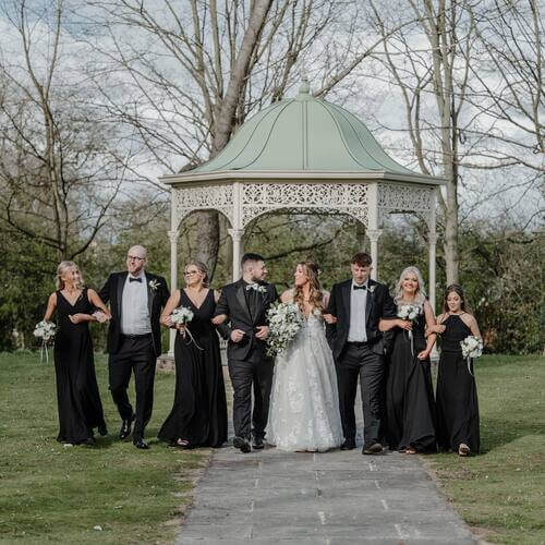 Black and white themed wedding guests dressed in black