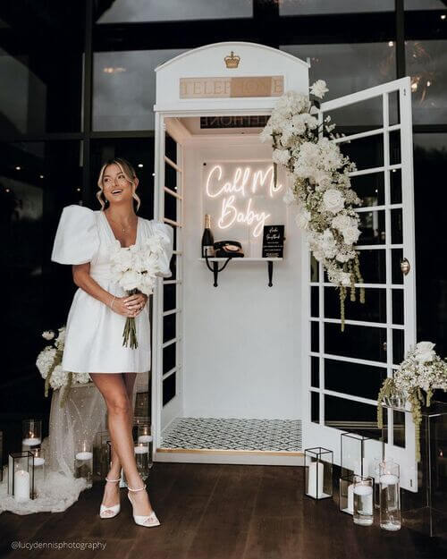 cute phone booth welcome sign wedding