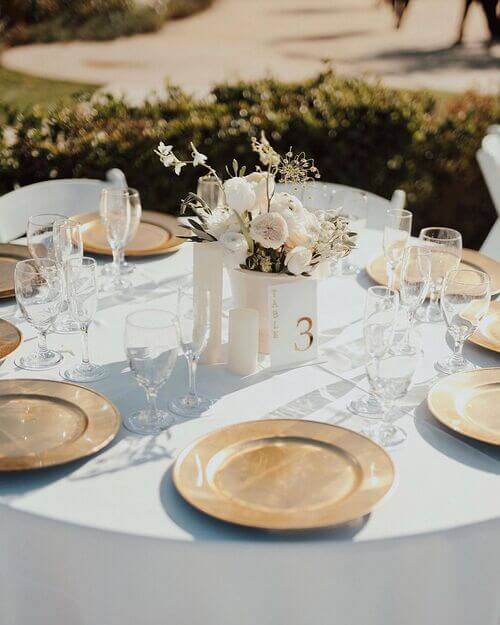 gold and white centerpiece round table