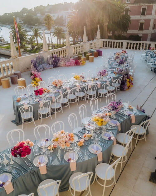 wildflower themed wedding serpentine tables