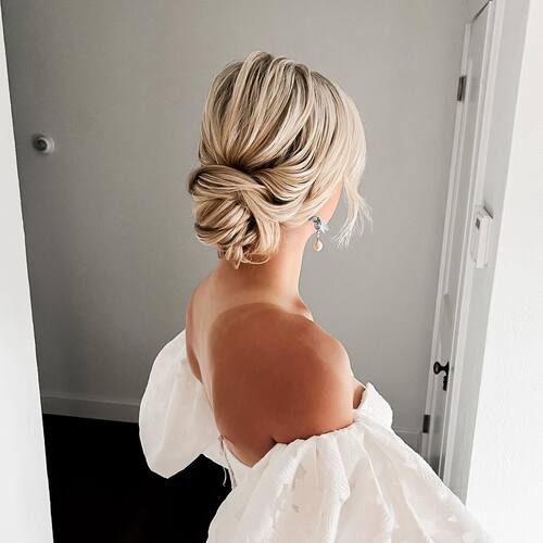 Low bun with braid bridal hairstyle