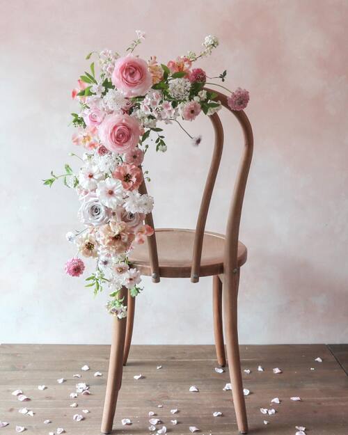 Floral arrangement on wedding chair