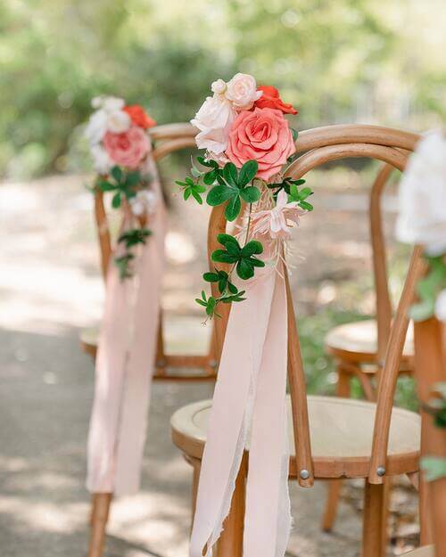 Baby pink and red flower wedding chair decor
