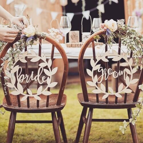 Bride and groom sign wedding chair decor