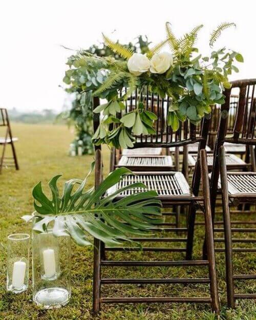 Wedding chair decor full of foliage