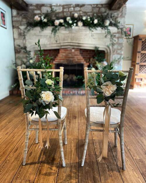 Wedding chair decor roses and leaves