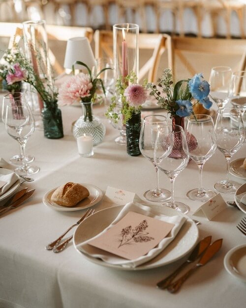 Neutral colors with pops of blue wedding table decor