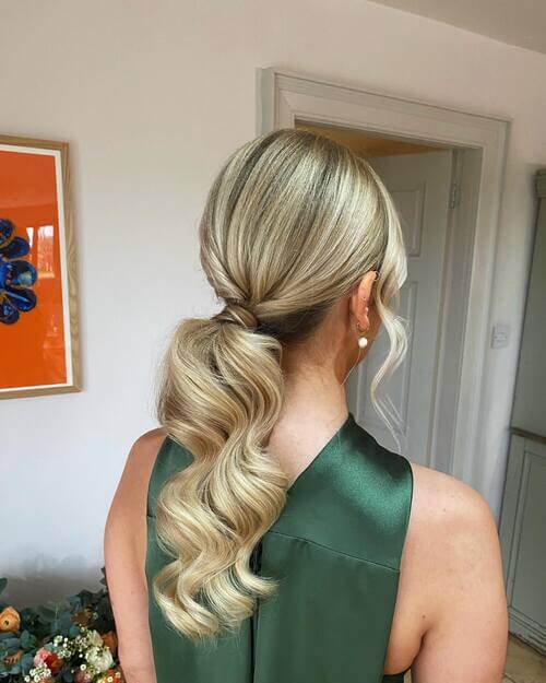 Sleeked-back pony bridesmaid hairstyle idea