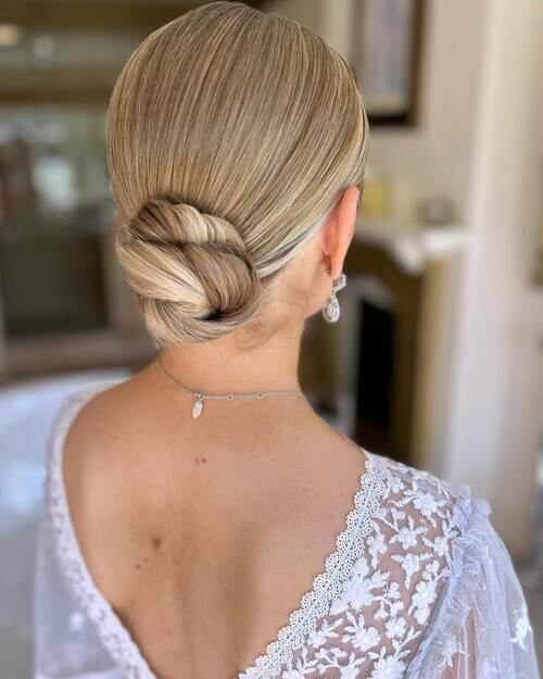 Twisted low bun bridesmaid hairstyle