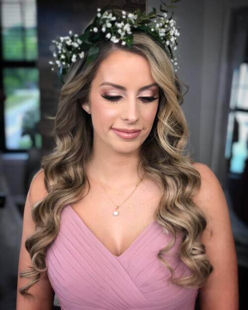 Floral head piece bridesmaid hairstyle