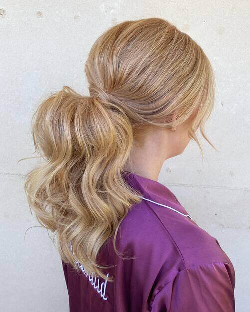 Low-rise pony with volume bridesmaid hairstyle ideas