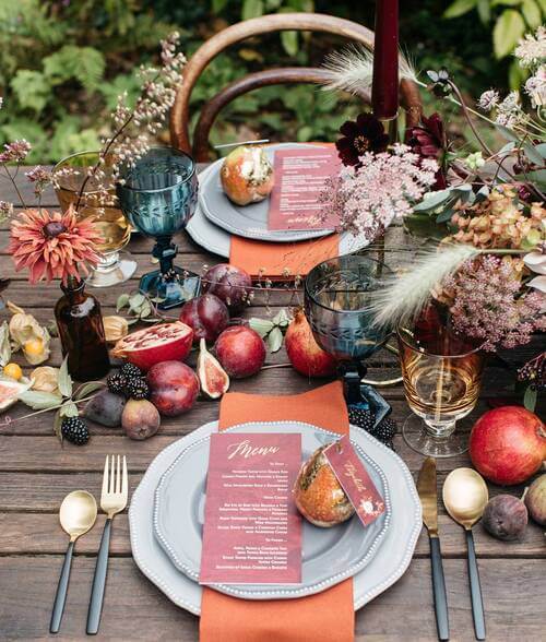 Fall wedding table scape pomegranates and fruit