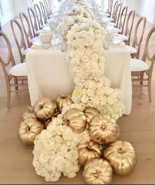 Fall wedding table scape with pumpkins