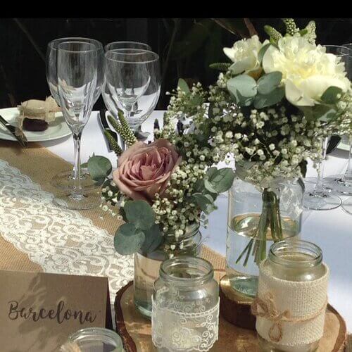 Rustic wedding table center pieces with jars