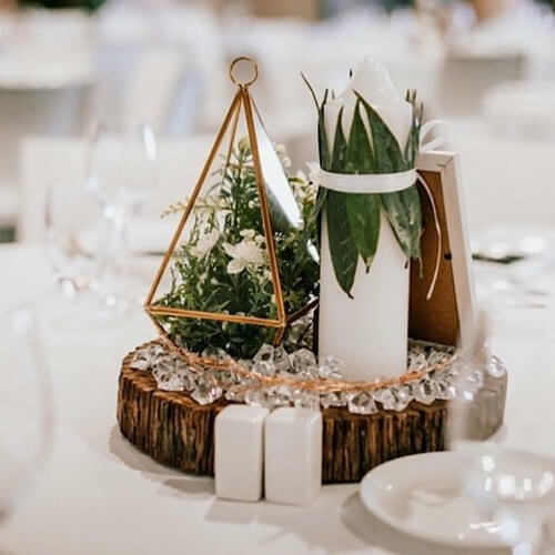 Rustic wedding table center piece sticks and candles