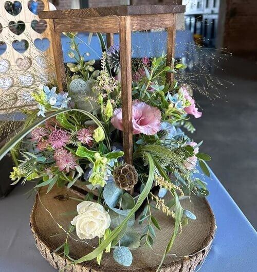 Rustic wedding table center piece wild flowers