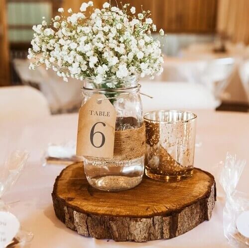 Rustic wedding table center pieces with jar and table number