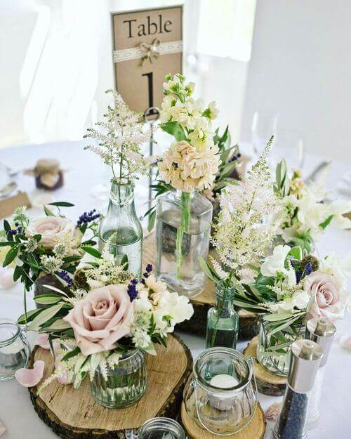 Rustic wedding table center piece floral arrangement