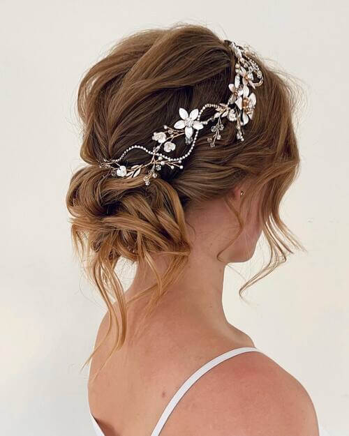 Romantic wedding hairstyle with headpiece