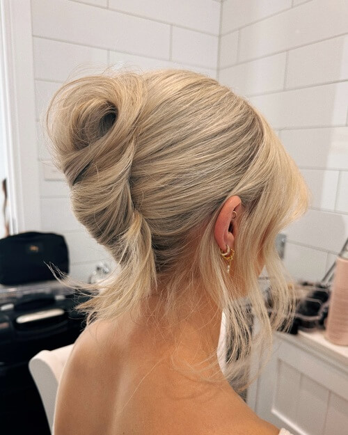 Classic updo modern and sleek romantic wedding hairstyle