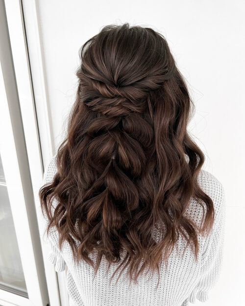 Half up, half down romantic wedding braid hairstyle