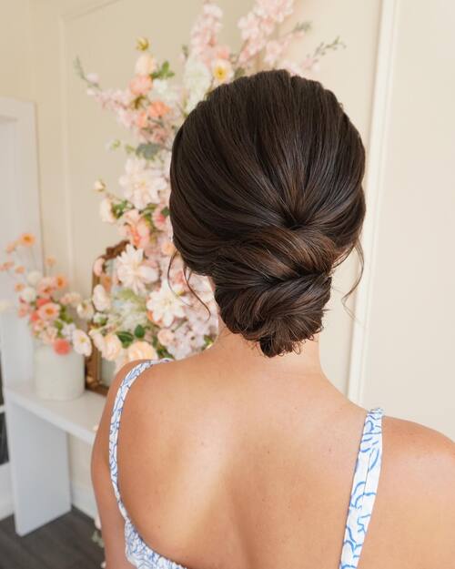 Wedding up-do braided and twisted low bun style