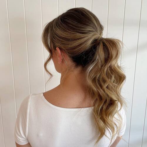 Mid height pony tail wedding up-do