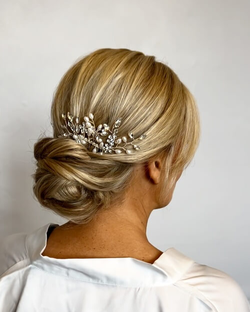 Messy low bun wedding up-do