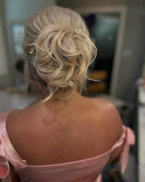 Wedding up-do whimsical and flowy