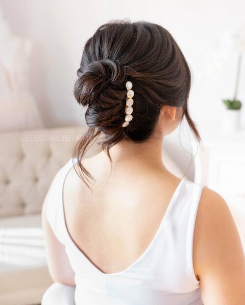 Wedding up-do elegant with pearl hairclip 