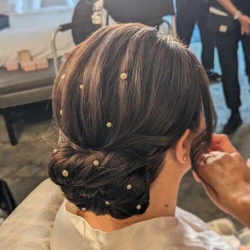 Wedding up-do with gold pearl pins