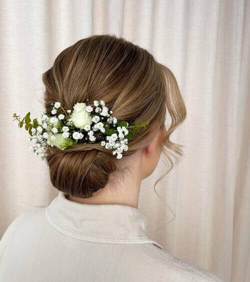 Wedding up-do with flowers