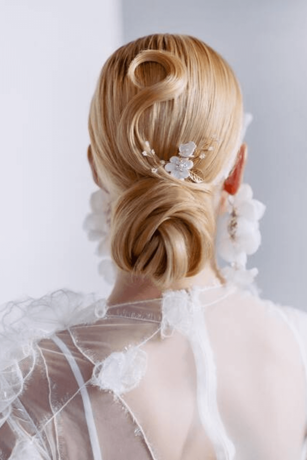 28 Wedding Updos That Brides & Guests Look Amazing In